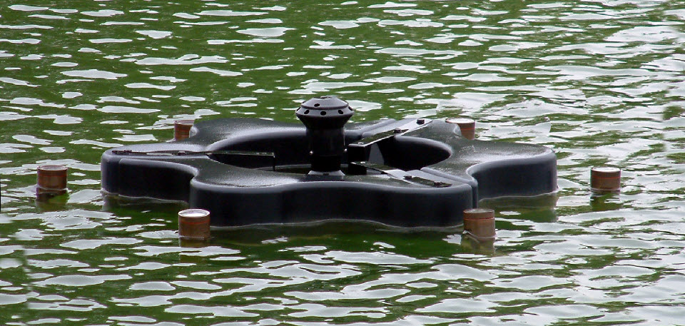 Low-profile float system of the Kasco fountain with optional six-light kit.